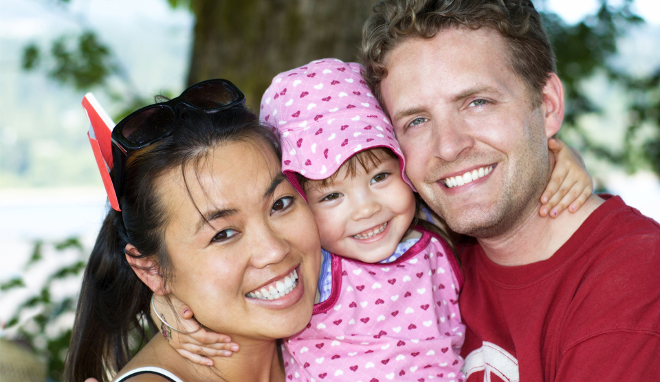promotional slideshow image #2 showing smiling family